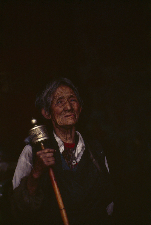 95 A 25 88a 1995 Old Tibetan woman w Prayer Wheel